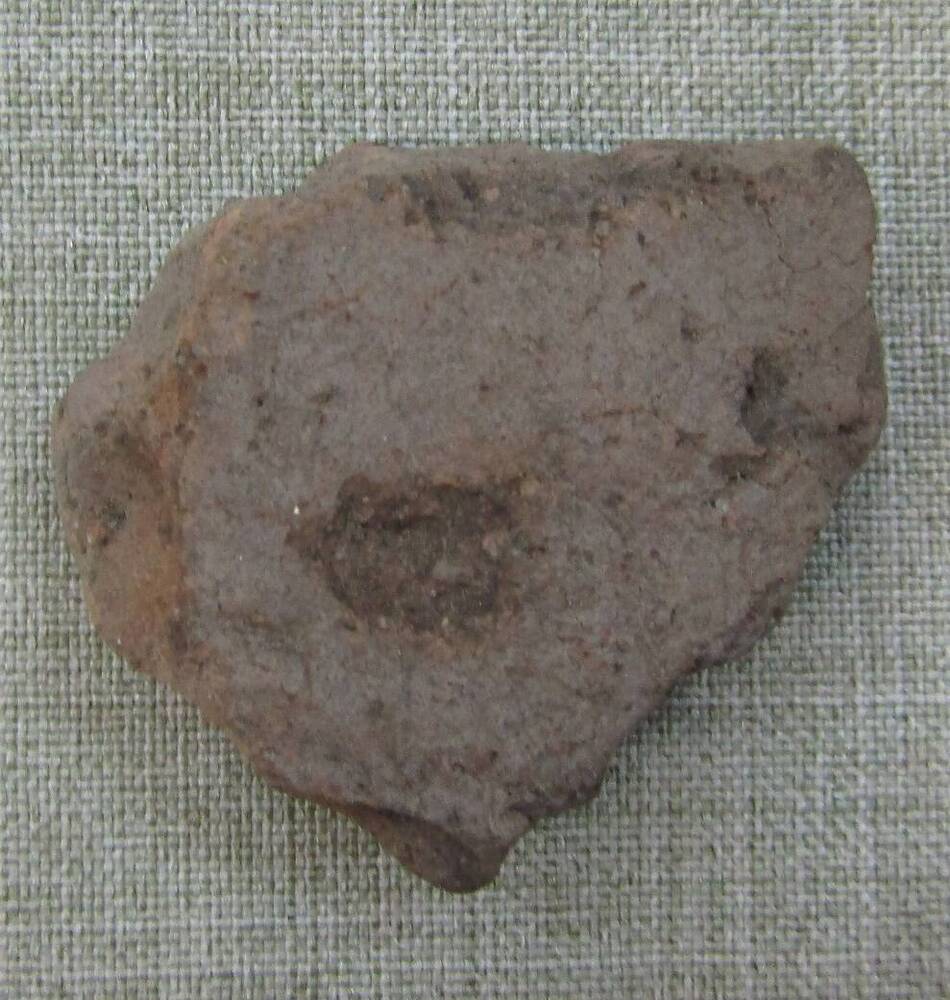 Фрагмент глиняного сосуда