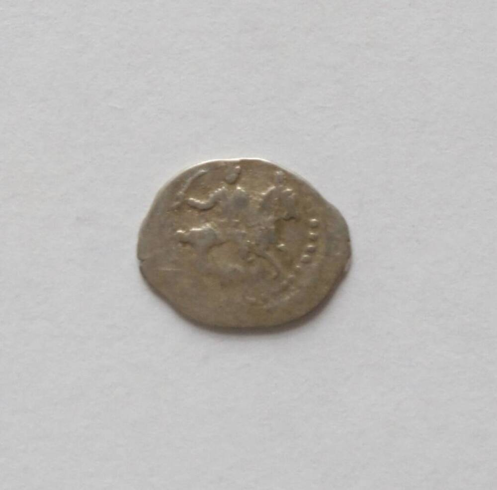 Монета. Иван IV (1533-1584). Деньга в весе копейка. М., т. 1, 1-1. Из клада монет.
