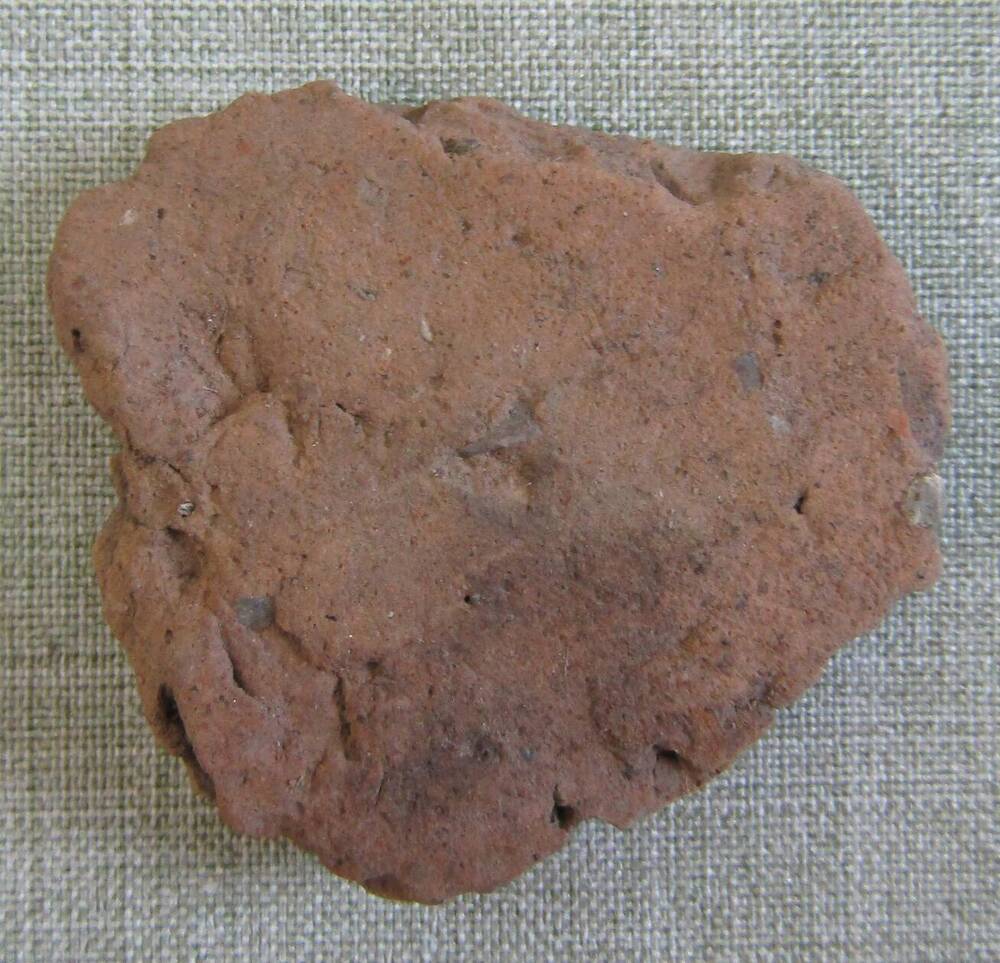 Фрагмент глиняного сосуда