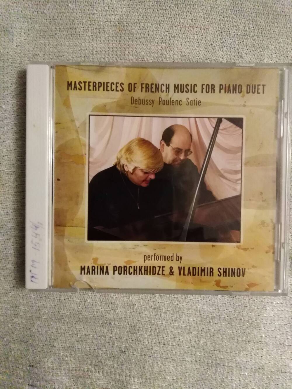 Компакт диск с записью музыки разных авторов в исполнении пианистки Марины Порчхидзе  и композитора Владимира Шинова, в упаковке.