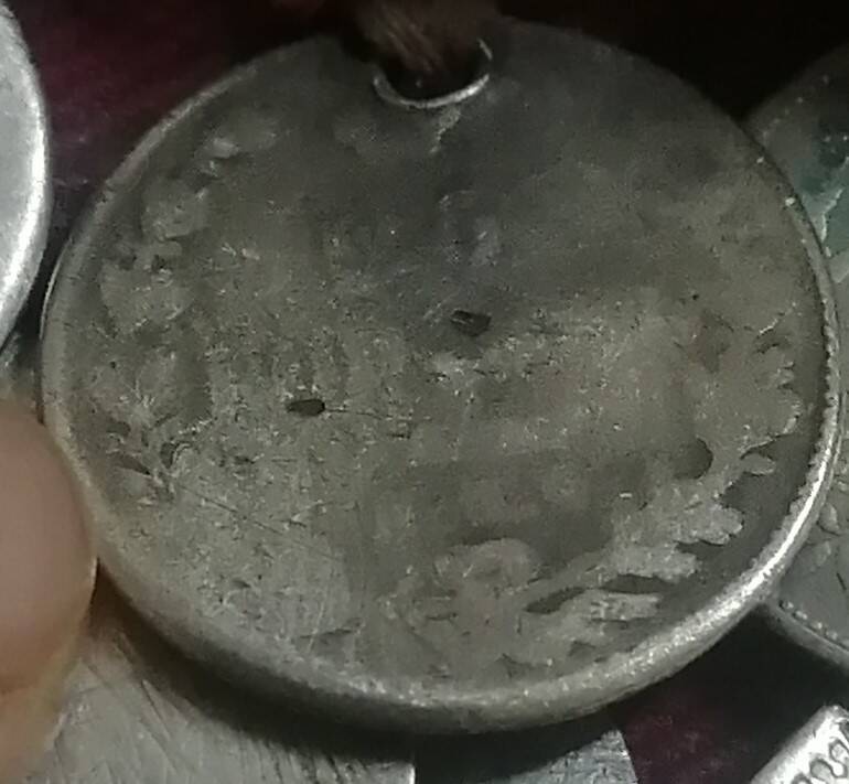 Монета с нагрудника 25 коп