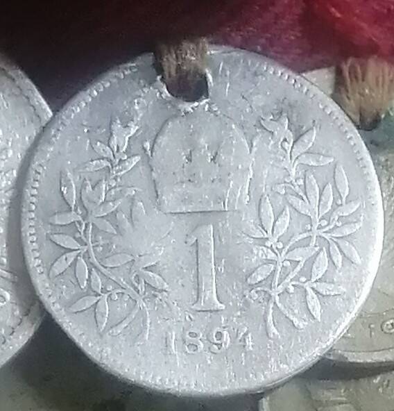 Иностранная монета с нагрудника 1.1894 года