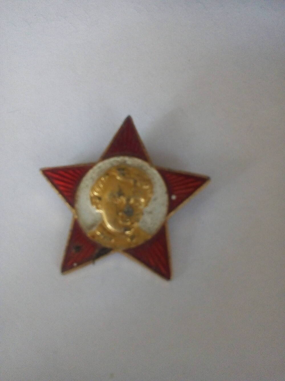 Значок  Октябрятская звездочка.