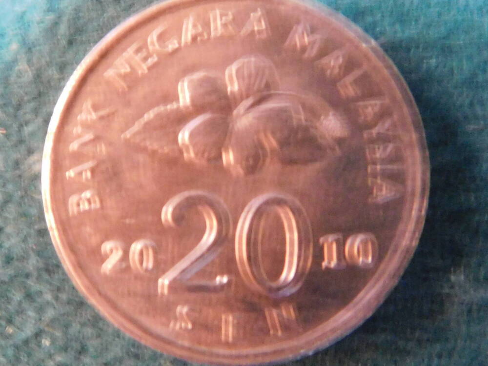 Монета. 20 SEN 2010 год. Малайзия.