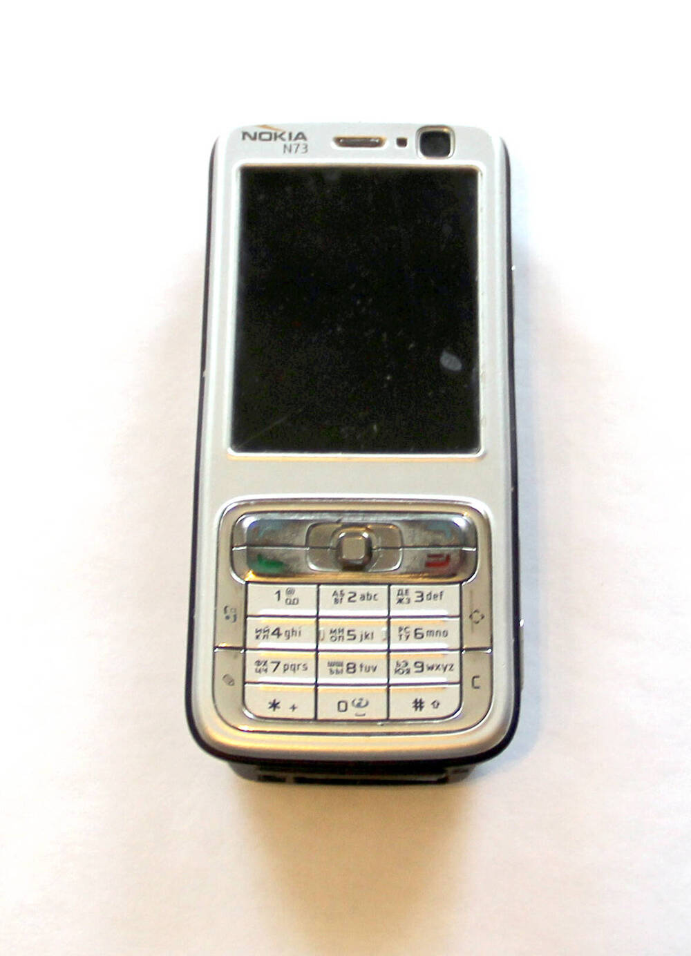 Сотовый телефон: Nokia N73.