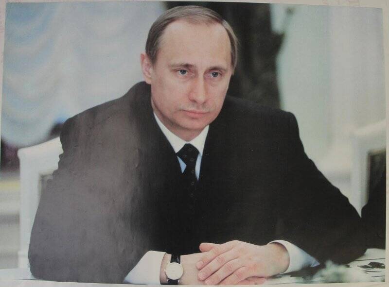 Плакат – кандидата в президенты России Владимир Путин.