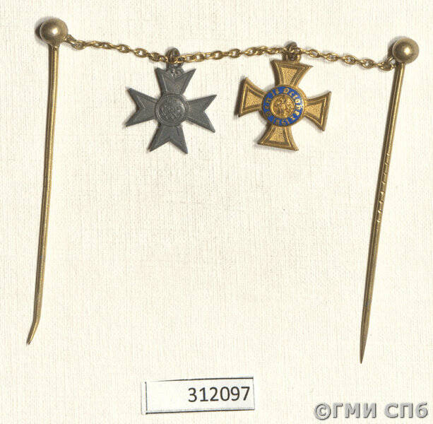 Колодка фрачная со знаками ордена Королевской короны и креста За заслуги в военной помощи.