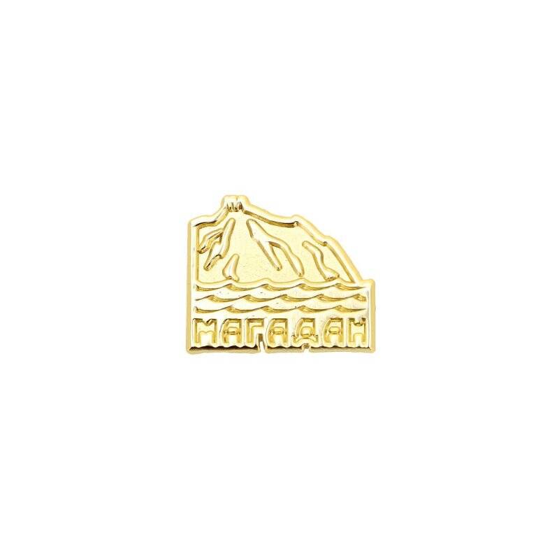 Значок «Магадан» с изображением Каменного венца.