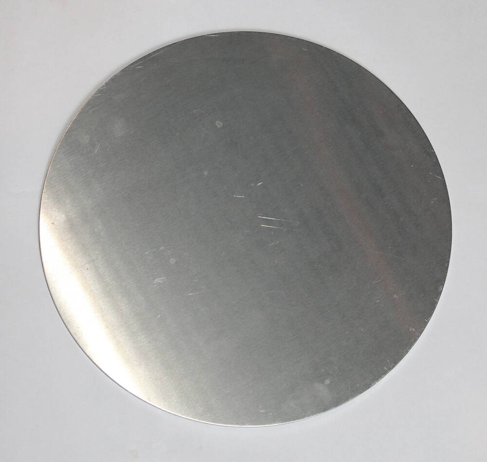 Лист алюминиевый круглой формы.