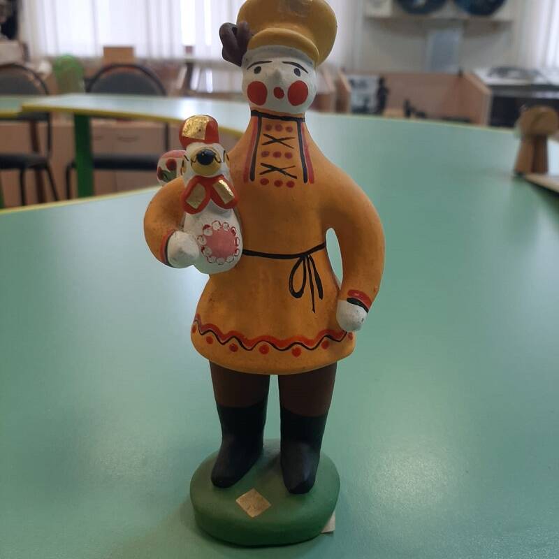 Дымковская игрушка Мужик с петухом