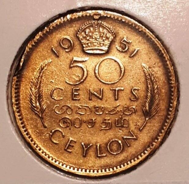 Монета. 50 центов