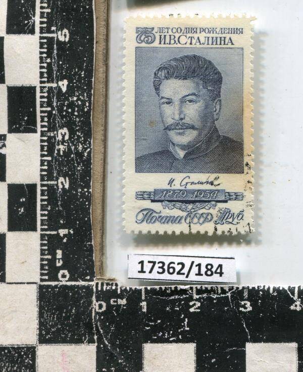 Марка с надписью 75 лет со дня рождения И.В. Сталина. 1879-1954. Фон серый.