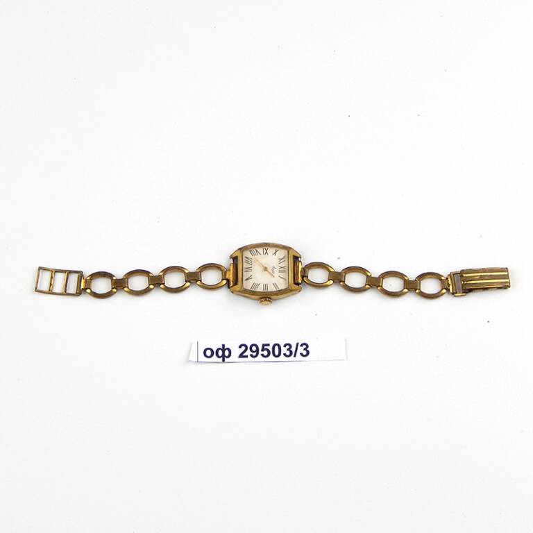 Часы наручные женские Луч в желтом овальном корпусе с браслетом-цепью. Циферблат белый с римскими обозначениями. 1977 г.