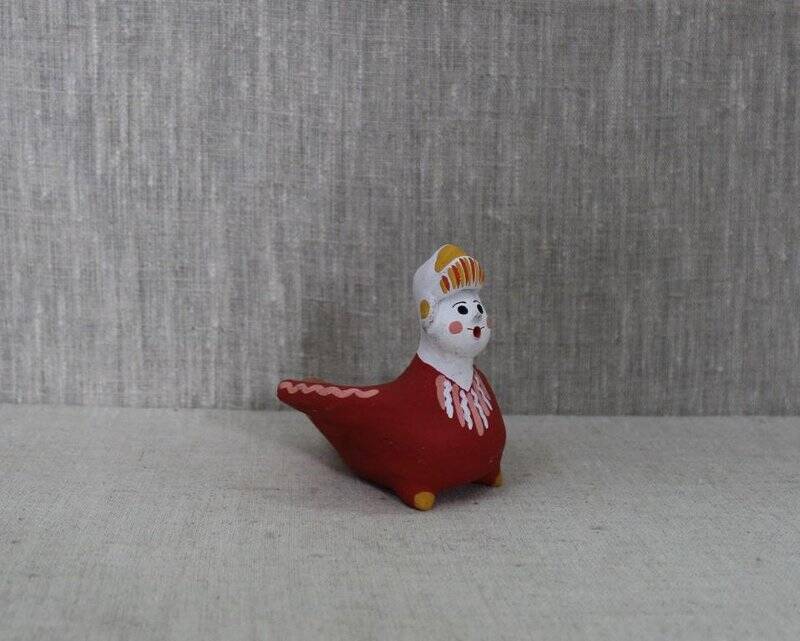 Каргопольская глиняная игрушка «Свистулька. Птица Сирин».