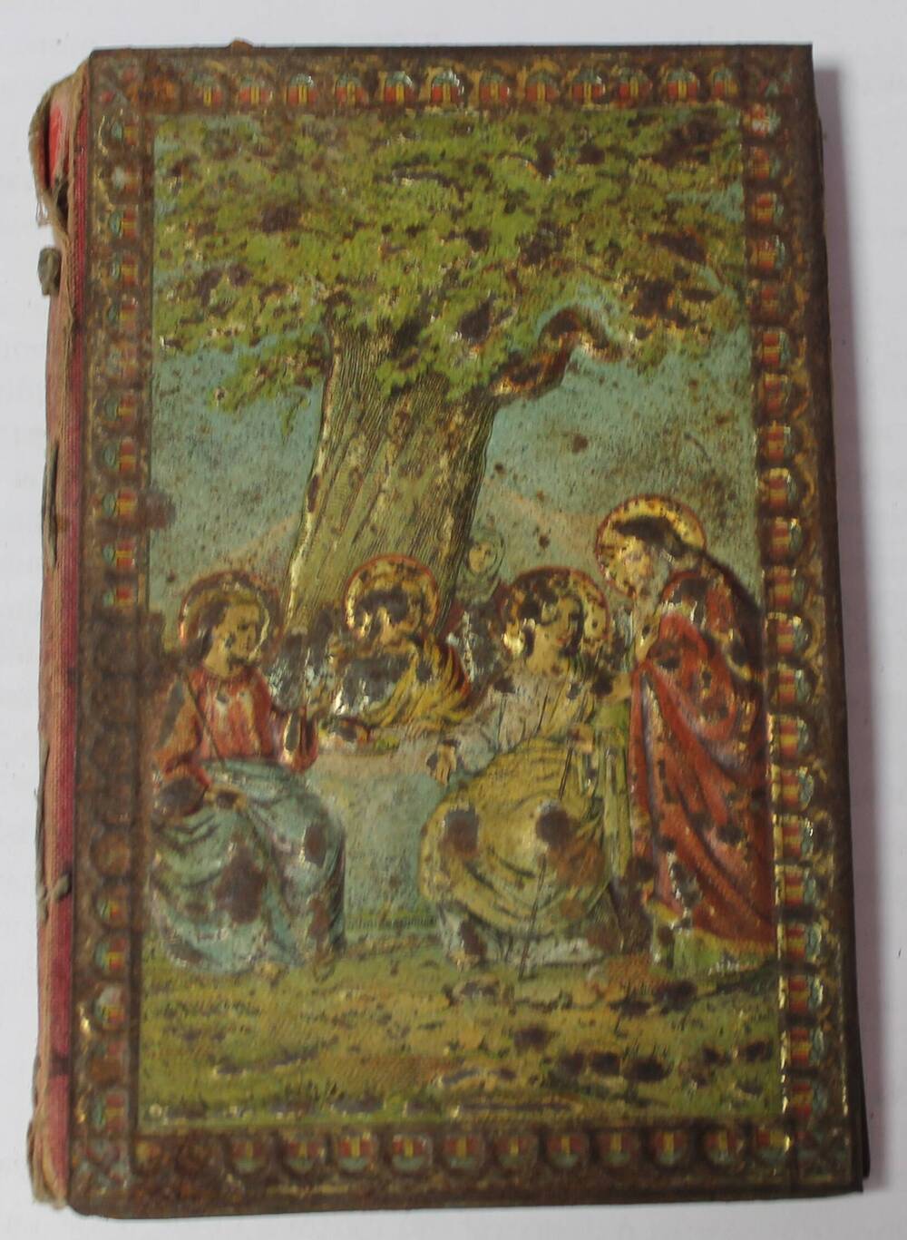 Помянник семейный в жестяной обложке с изображением библейского сюжета.