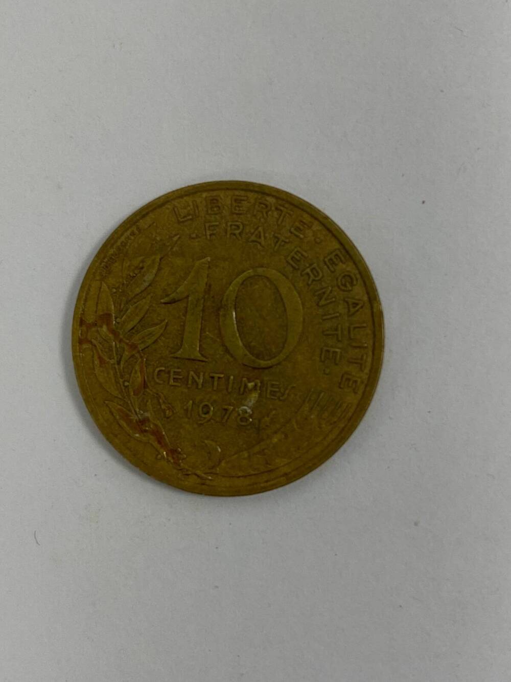 Монета французская, достоинством 10 1978 г. с изображением женского профиля.