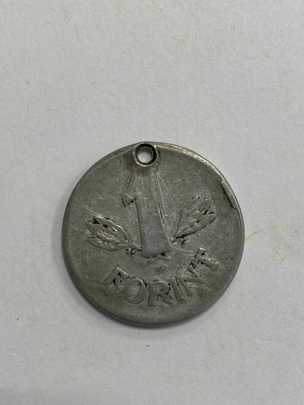 Монета Венгерская, достоинством 1 форинт из металла белого цвета.