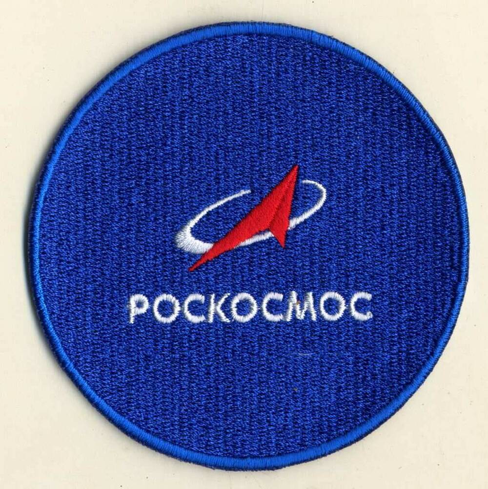 Эмблема c изображением логотипа Госкорпорации Роскосмос