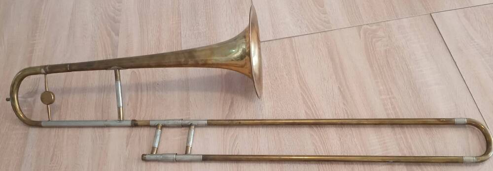Тромбон ( духовой амбушюрный инструмент)