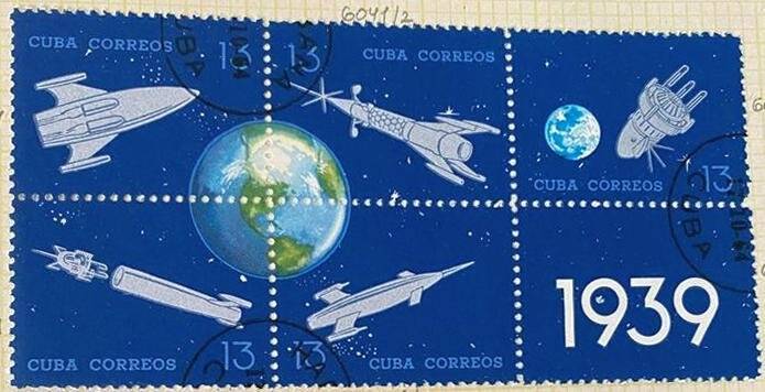 Сцепка из пяти почтовых марок и купона «Земля, ракеты и спутники». Погашена. Серия: Первый постракетный эксперимент на Кубе