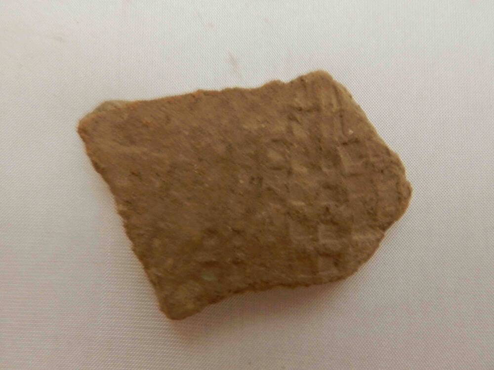 Фрагмент керамики периода неолита.