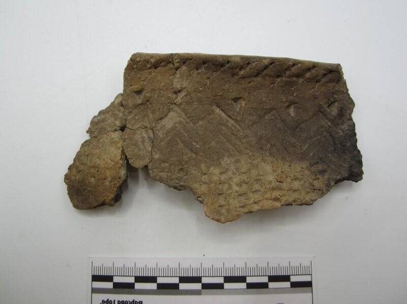 Фрагмент венчика керамического сосуда (склеен с фрагментами ТОКМ 11474/1621-1622)