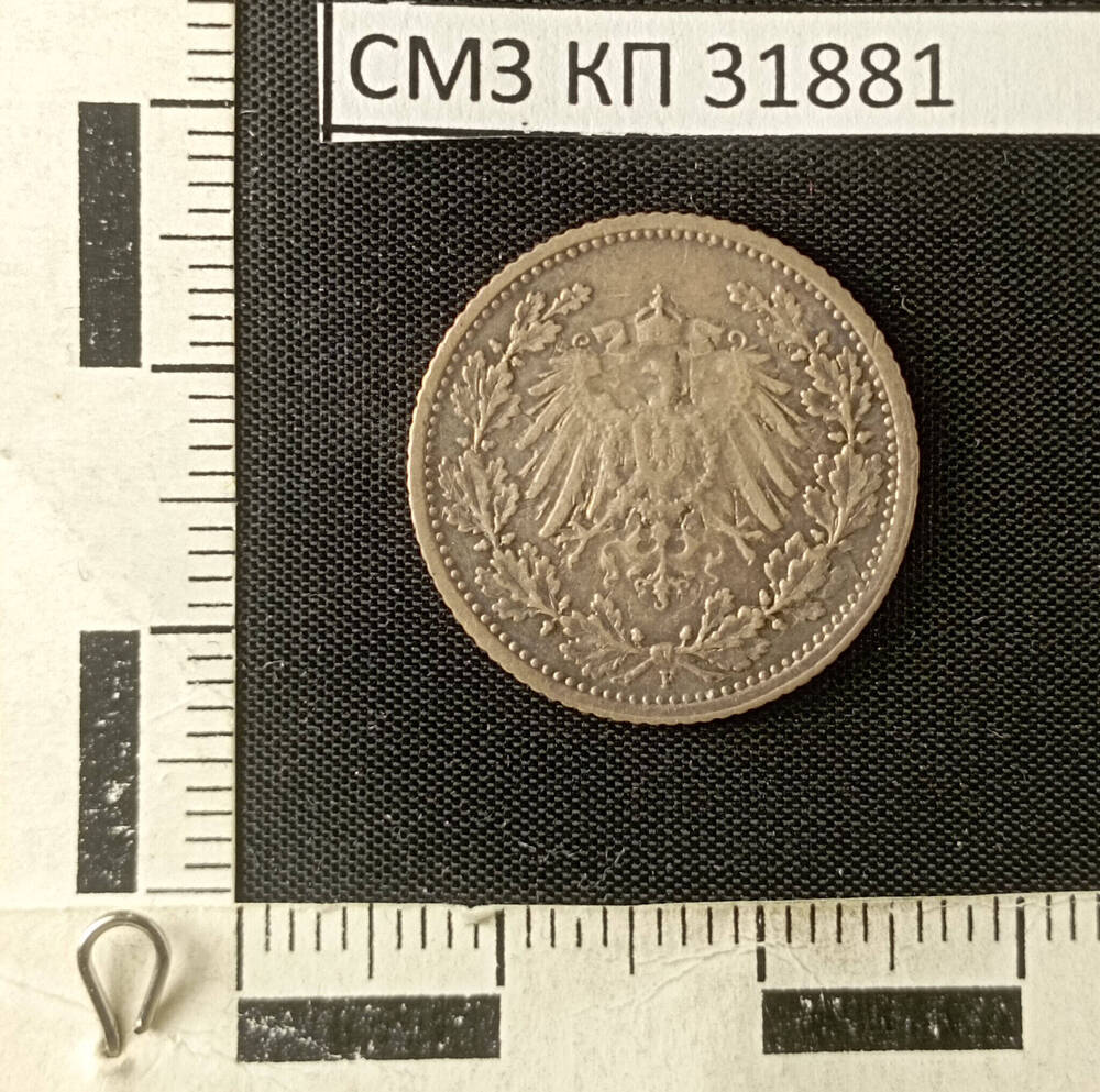 Монета. 1/2 mark. Deutsches Reich.