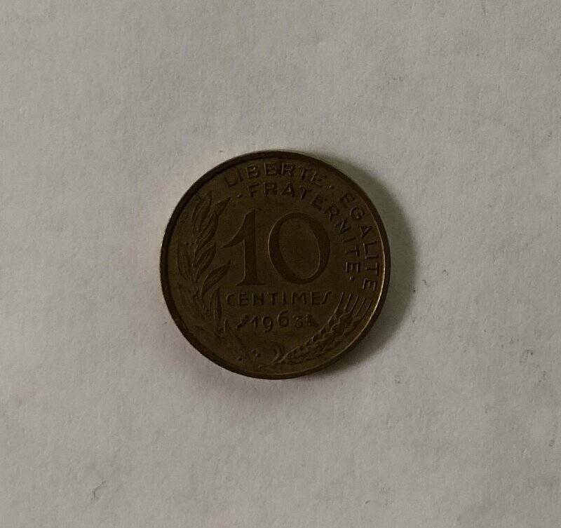 Монета номиналом 10  centimes 1963 года.