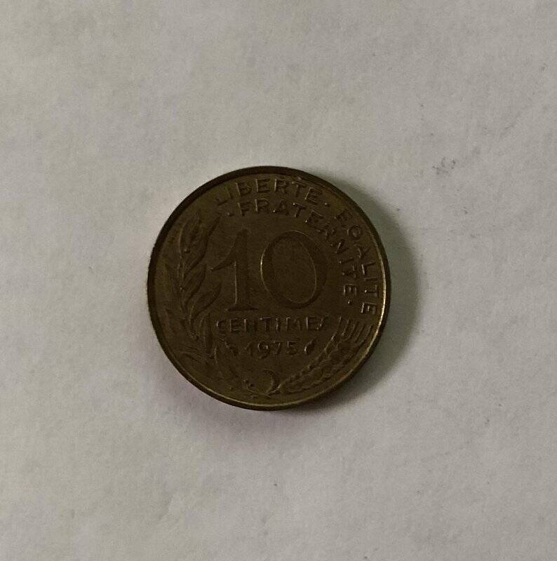 Монета номиналом 10  centimes 1975 года.