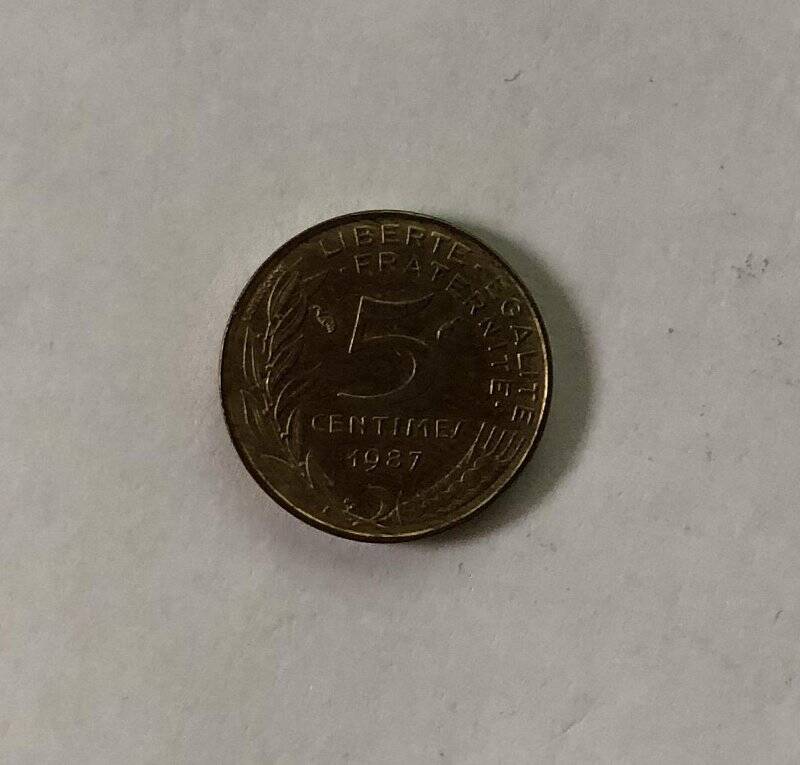 Монета номиналом 5  centimes 1987 года.